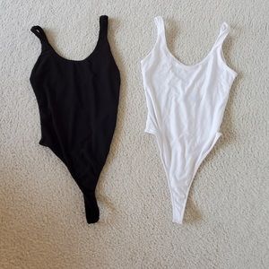 White and black bodysuits